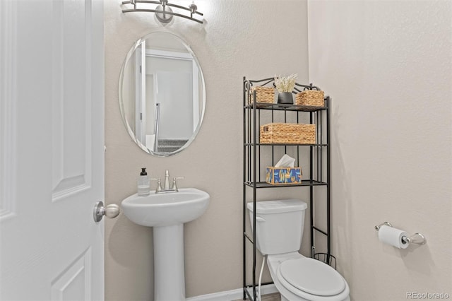23534 E 5th Pl, Aurora, CO 80018 - half bath featuring toilet and a sink