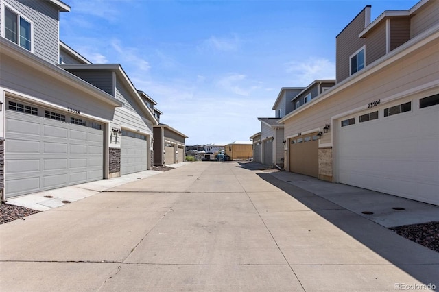 23534 E 5th Pl, Aurora, CO 80018 - view of concrete road featuring a residential view