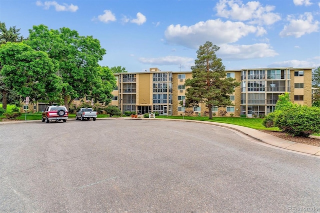 13626 E Bates Ave Unit 110, Aurora, CO 80014 - view of apartment building / complex with uncovered parking