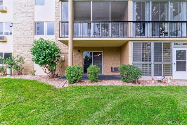 13626 E Bates Ave Unit 110, Aurora, CO 80014 - property entrance with a lawn
