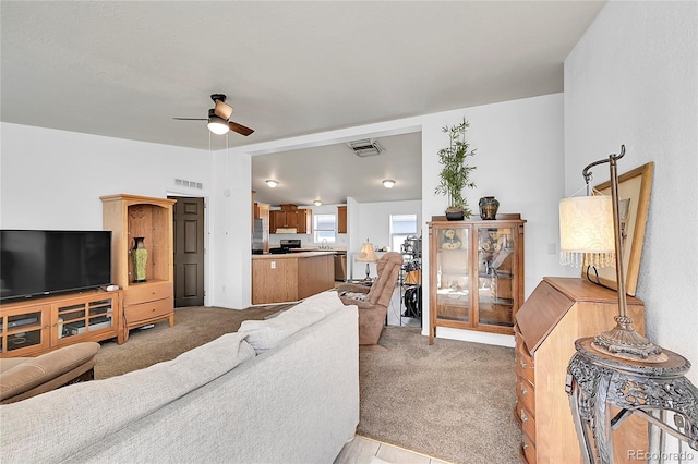 6631 E 78th Ave, Commerce City, CO 80022 - living area with light carpet, a ceiling fan, and visible vents
