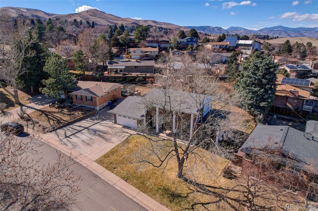 bird's eye view with a residential view and a mountain view