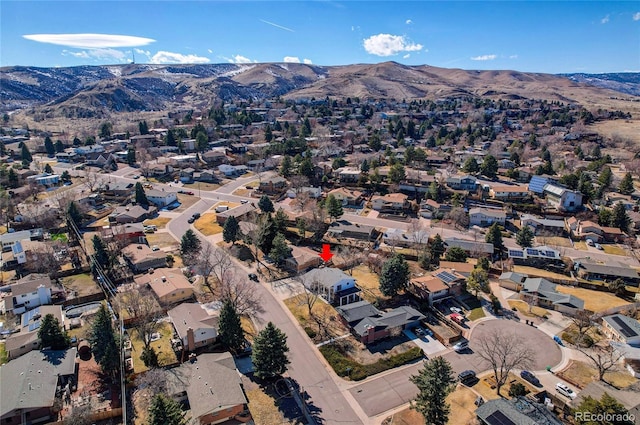 bird's eye view with a residential view and a mountain view