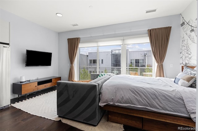 2550 Lawrence St Unit Rb306, Denver, CO 80205 - bedroom featuring wood finished floors, access to outside, and recessed lighting