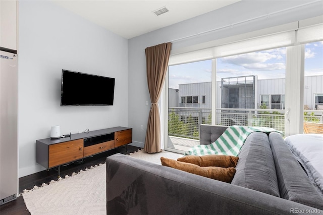 2550 Lawrence St Unit Rb306, Denver, CO 80205 - living room with baseboards and wood finished floors