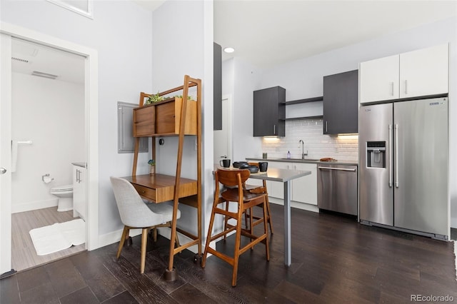 2550 Lawrence St Unit Rb306, Denver, CO 80205 - dining space with dark wood-type flooring and recessed lighting