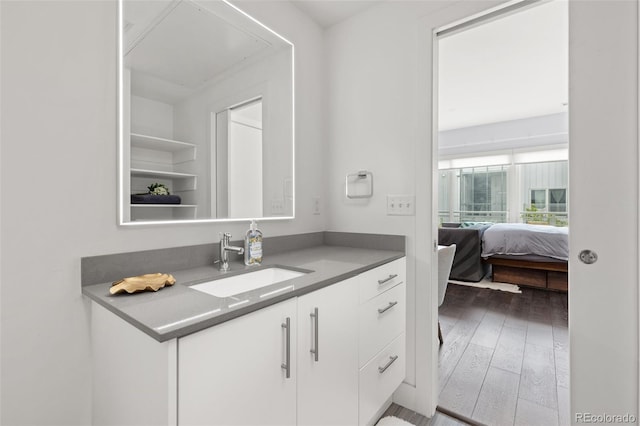 2550 Lawrence St Unit Rb306, Denver, CO 80205 - bathroom featuring vanity and wood finished floors