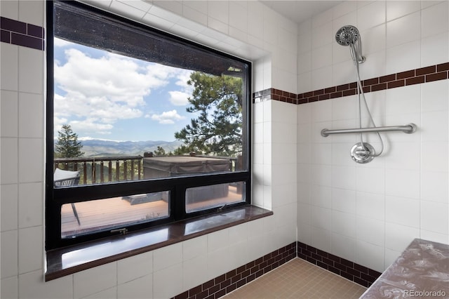 29095 Summit Ranch Dr, Golden, CO 80401 - full bathroom with tiled shower and a mountain view