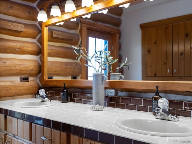 29095 Summit Ranch Dr, Golden, CO 80401 - detailed view of a sink, log walls, and tasteful backsplash