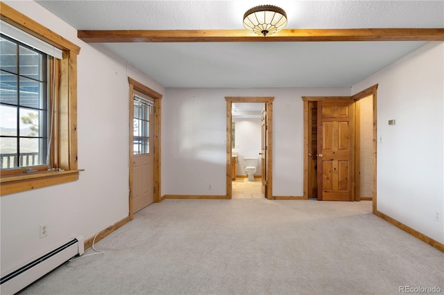 29095 Summit Ranch Dr, Golden, CO 80401 - unfurnished bedroom with baseboard heating, beamed ceiling, carpet, baseboards, and ensuite bathroom