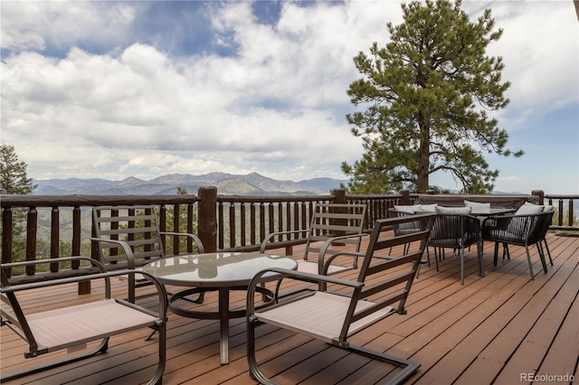 29095 Summit Ranch Dr, Golden, CO 80401 - deck with outdoor dining space and a mountain view