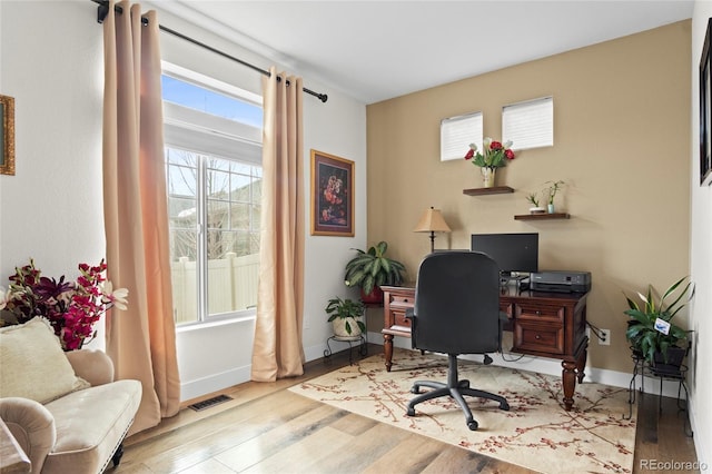 office area featuring light hardwood / wood-style floors