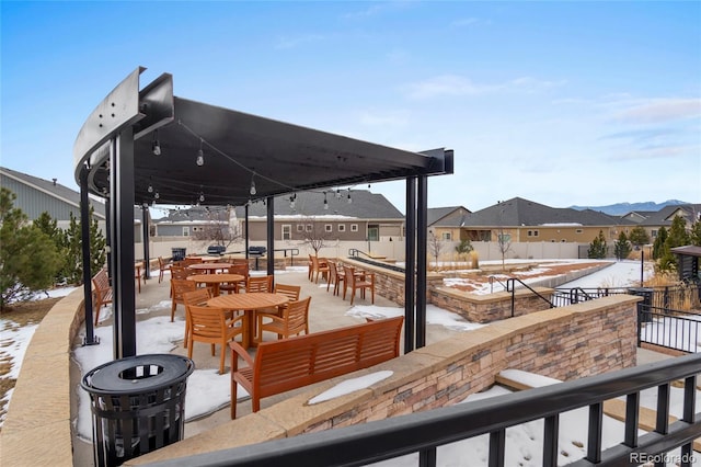 view of snow covered deck