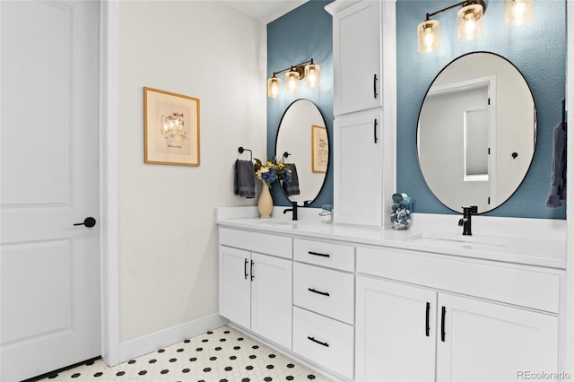 6484 Golden Briar Ln, Colorado Springs, CO 80927 - full bathroom with double vanity and baseboards