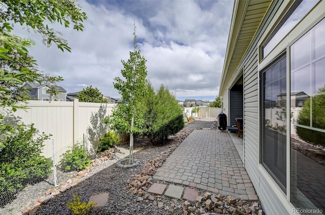 6484 Golden Briar Ln, Colorado Springs, CO 80927 - fenced backyard featuring a patio