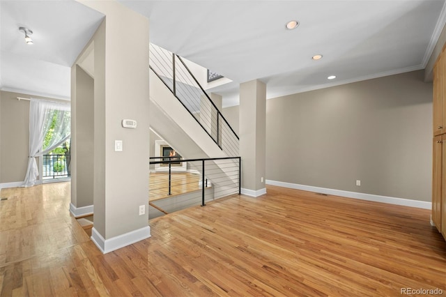 1635 N Franklin St, Denver, CO 80218 - unfurnished living room featuring light wood-style flooring, baseboards, recessed lighting, and ornamental molding