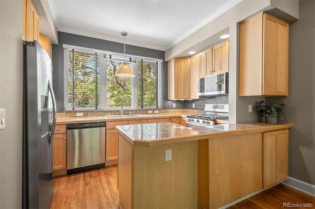 1635 N Franklin St, Denver, CO 80218 - kitchen featuring appliances with stainless steel finishes, a sink, a peninsula, tile counters, and light brown cabinets