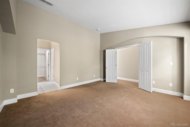 1635 N Franklin St, Denver, CO 80218 - unfurnished bedroom with carpet floors, baseboards, and ensuite bath