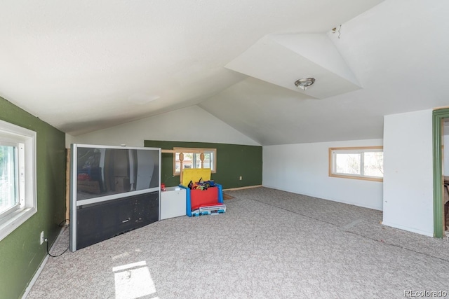 game room with lofted ceiling and carpet flooring