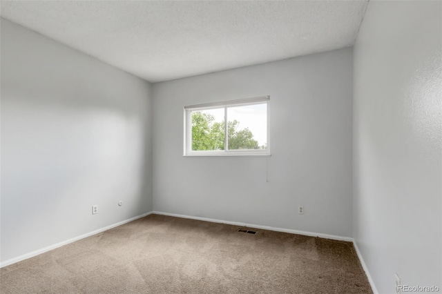 1005 S Lewiston Way, Aurora, CO 80017 - empty room with carpet and baseboards