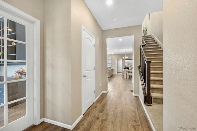 corridor featuring hardwood / wood-style floors