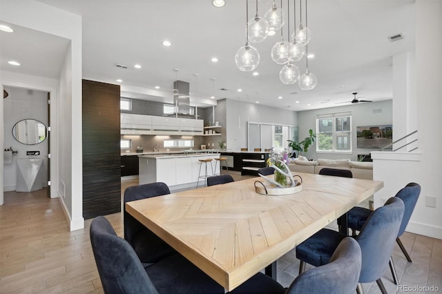 1711 Boulder St, Denver, CO 80211 - dining room with baseboards, recessed lighting, a ceiling fan, and light wood-style flooring