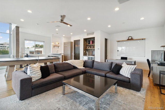 1711 Boulder St, Denver, CO 80211 - living room with wood finished floors, ceiling fan, and recessed lighting