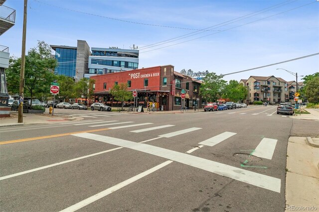 1711 Boulder St, Denver, CO 80211 - view of asphalt road with sidewalks, traffic signs, curbs, and street lighting