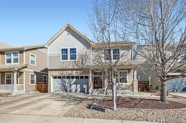 view of front of property with an attached garage, a porch, concrete driveway, and brick siding