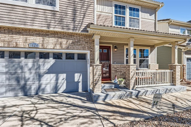 exterior space featuring a porch, concrete driveway, brick siding, and board and batten siding