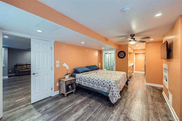 bedroom with recessed lighting, dark wood finished floors, a ceiling fan, and baseboards