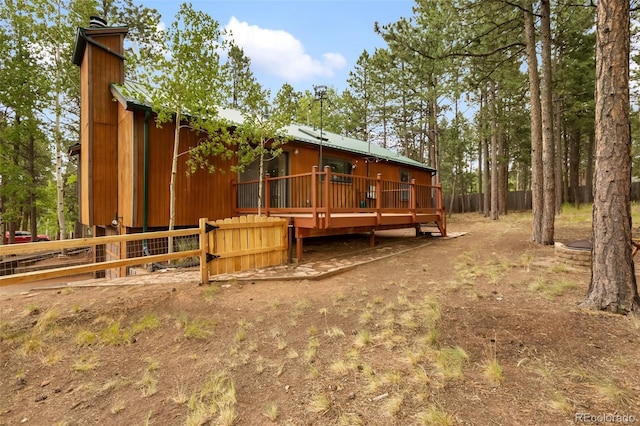 1343 Terri Ln, Woodland Park, CO 80863 - rear view of property featuring a wooden deck and a metal roof