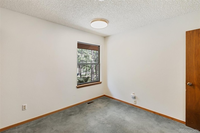 1343 Terri Ln, Woodland Park, CO 80863 - carpeted empty room featuring baseboards and a textured ceiling
