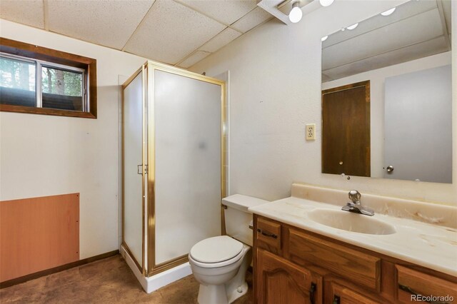 1343 Terri Ln, Woodland Park, CO 80863 - full bathroom featuring vanity, a shower stall, and a paneled ceiling