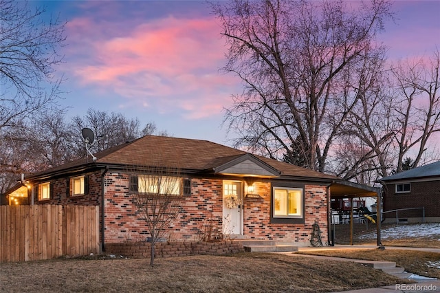 view of front of home featuring a carport