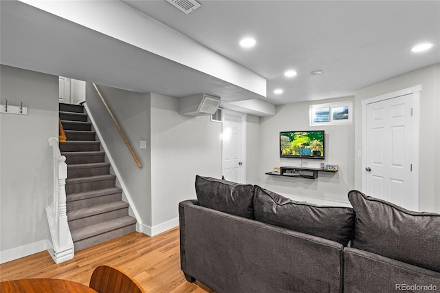 living room with light hardwood / wood-style floors