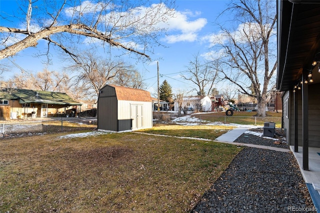 view of yard with a storage shed