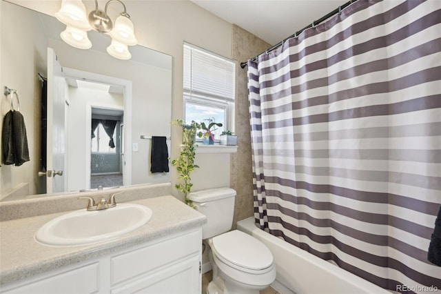 full bath featuring a chandelier, toilet, vanity, and shower / bathtub combination with curtain