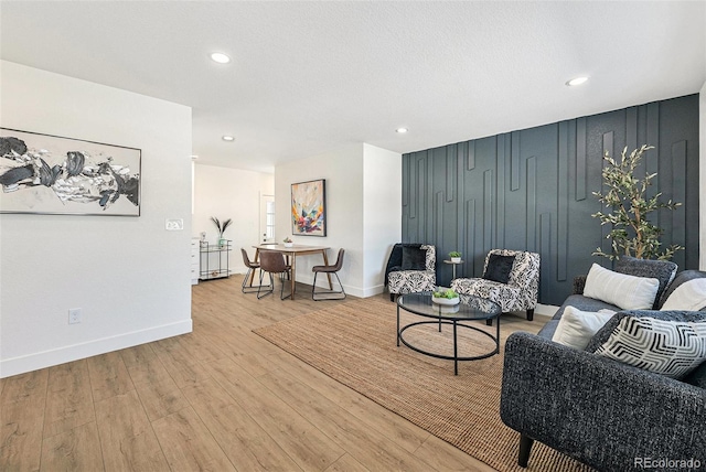 living room with light hardwood / wood-style floors