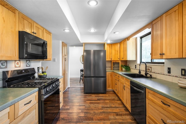 7603 W Coal Mine Pl, Littleton, CO 80128 - kitchen featuring range with gas cooktop, black microwave, freestanding refrigerator, dishwasher, and dark wood-style floors