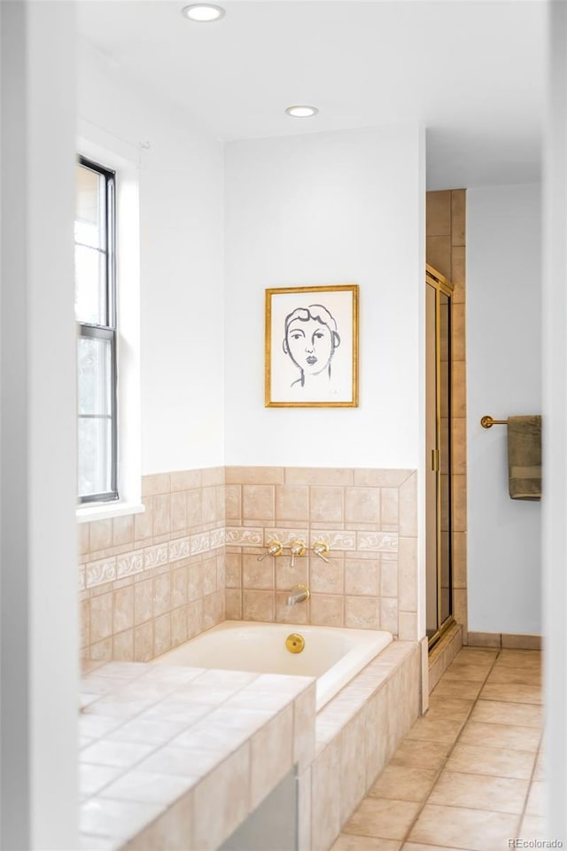 7603 W Coal Mine Pl, Littleton, CO 80128 - bathroom with a garden tub, a stall shower, healthy amount of natural light, and recessed lighting