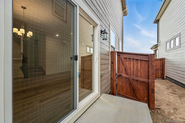 2116 Chambers Rd, Brighton, CO 80601 - exterior space featuring a chandelier and wood walls