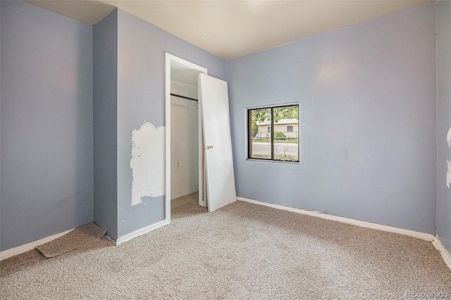 2280 S Decatur St, Denver, CO 80219 - unfurnished bedroom with carpet floors, a closet, and baseboards