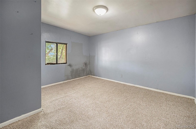 2280 S Decatur St, Denver, CO 80219 - carpeted spare room featuring baseboards
