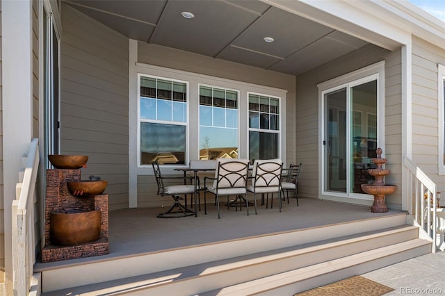 view of patio with outdoor dining area