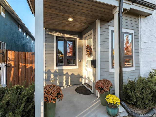 entrance to property featuring a porch