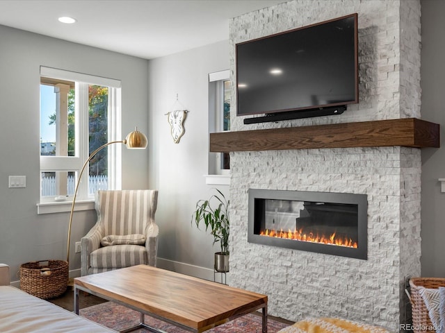 living area featuring a fireplace