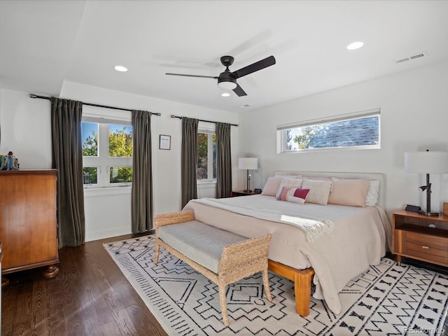 bedroom with hardwood / wood-style floors and ceiling fan