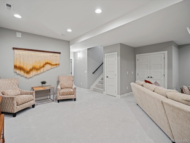 living room featuring light colored carpet