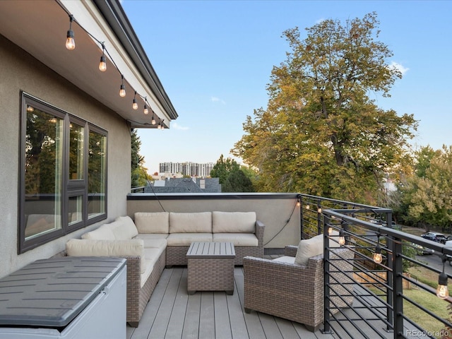 deck with an outdoor hangout area